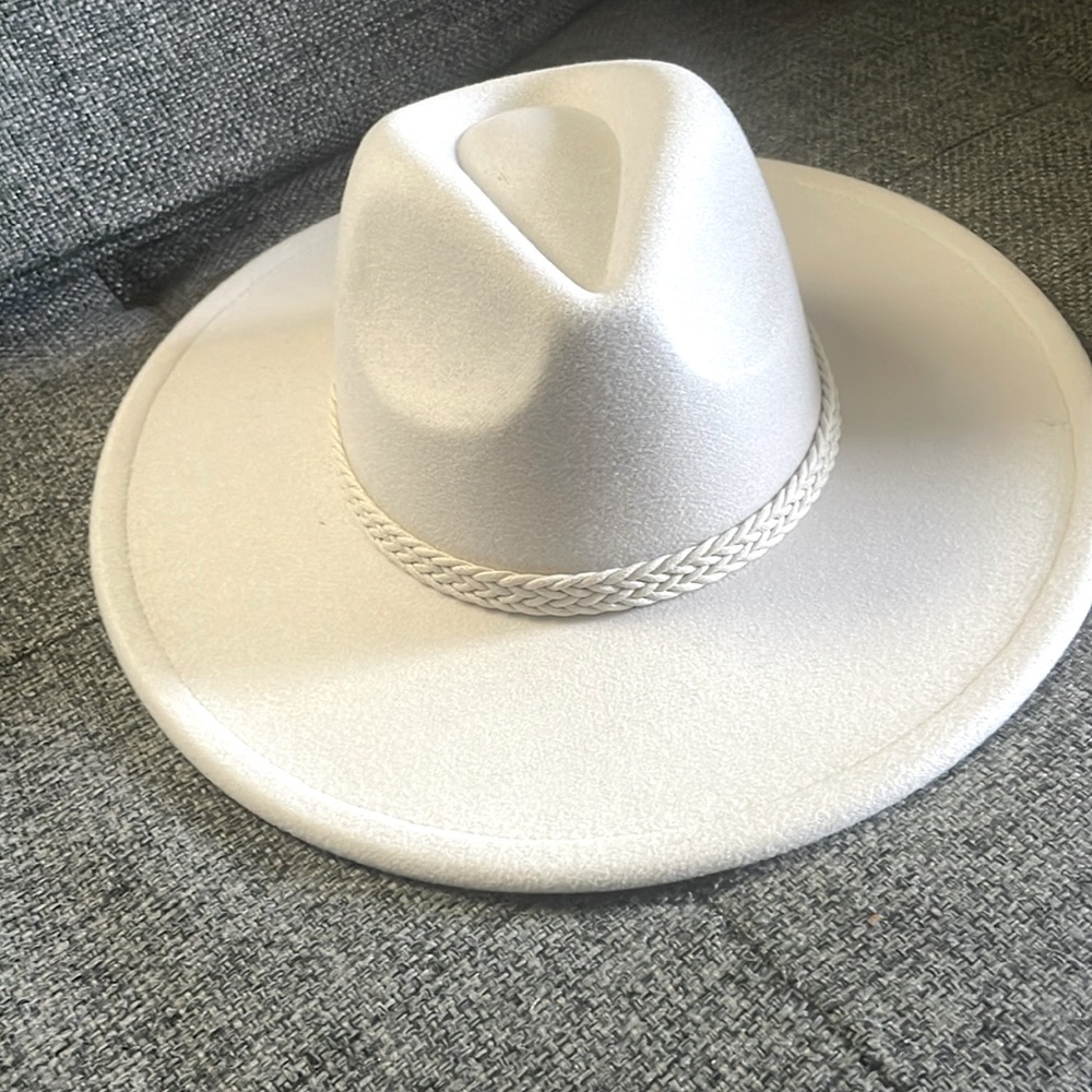 White boho hat. Never worn too big for me.